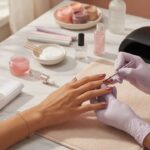 Professional manicure and nail prep at a modern salon before vacation travel